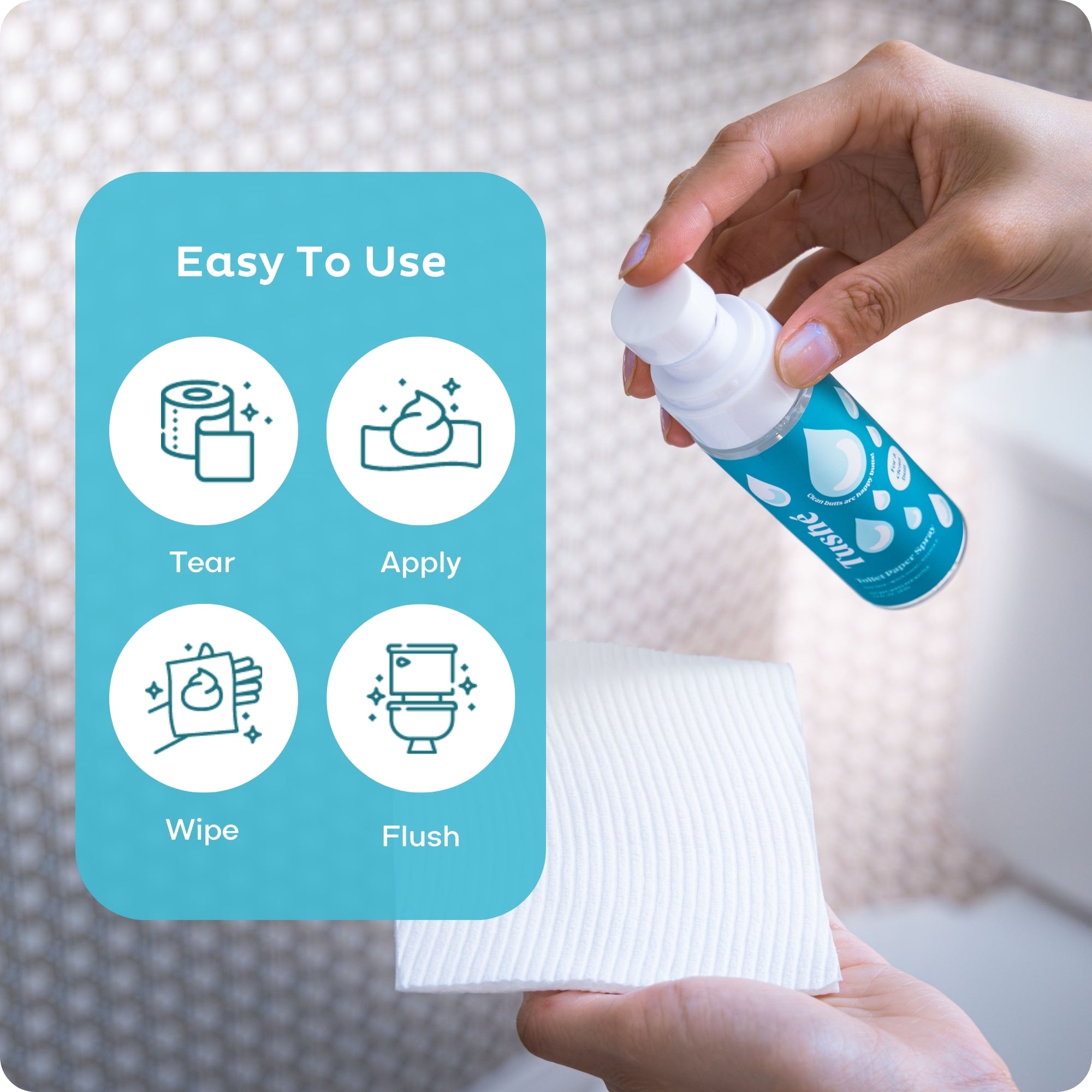 Dark Blue travel-sized Tushe toilet paper spray bottle misting onto toilet paper: easy to use for butt cleaning: tear toilet paper, apply spray, wipe, flush.